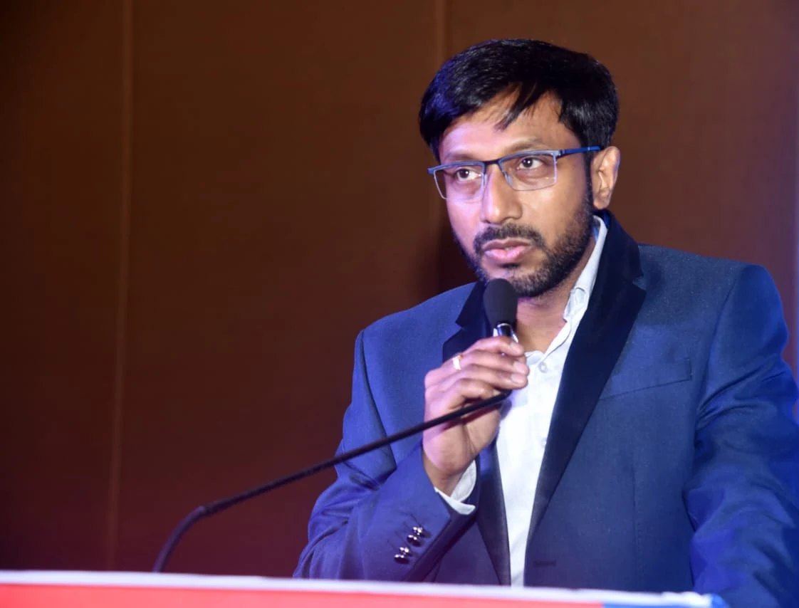 Dr. N.K. Das speaking at a medical conference