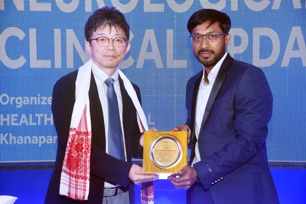 Dr. N.K. Das receiving an award