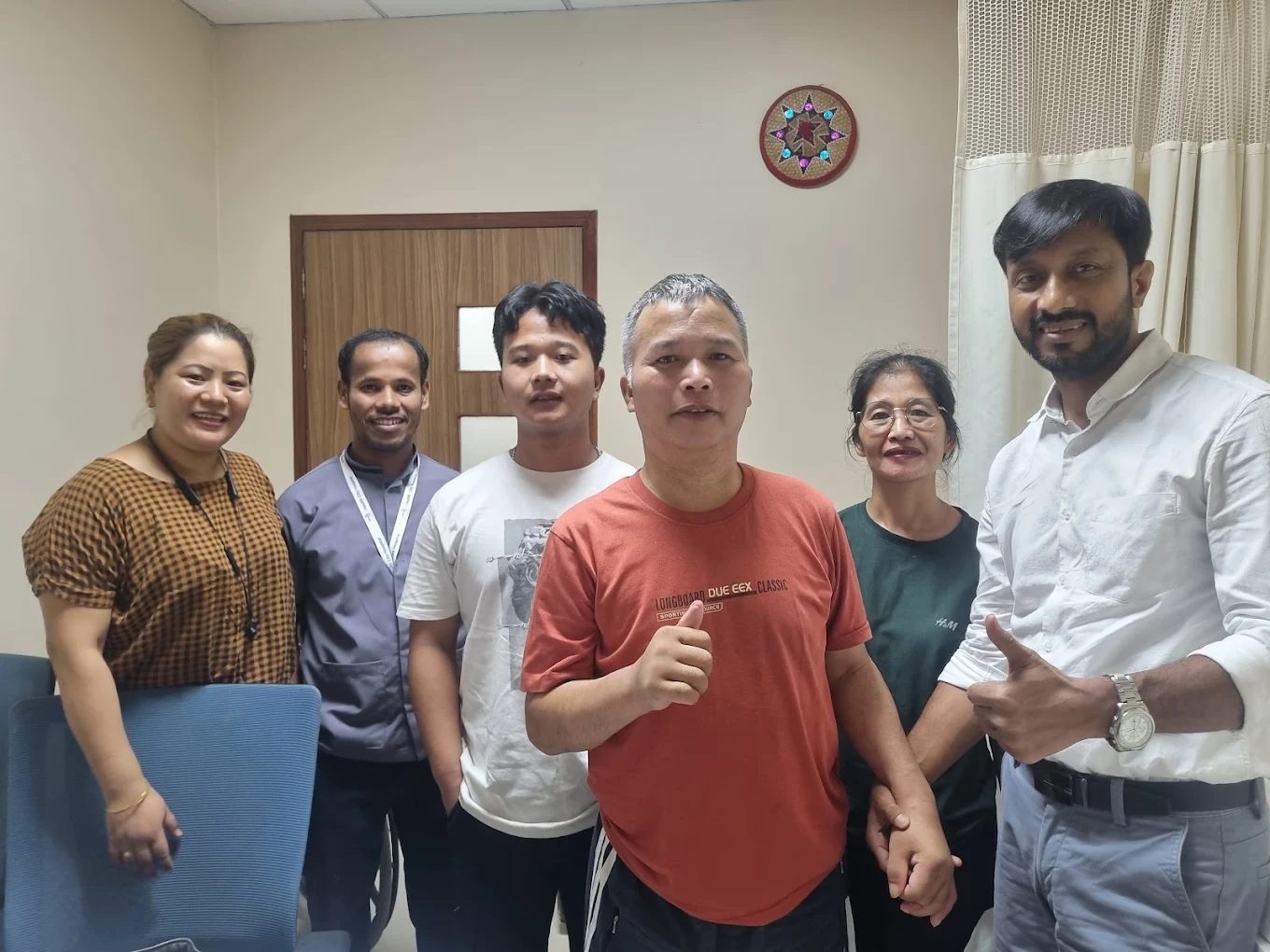 Dr. N.K. Das with a recovered patient and family